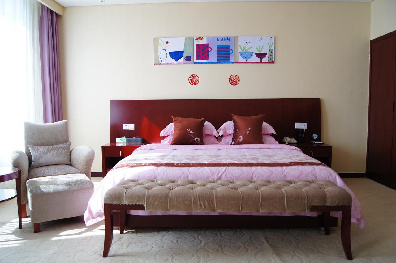 Fuxing Oriental Boutique Hotel Чифын Номер фото