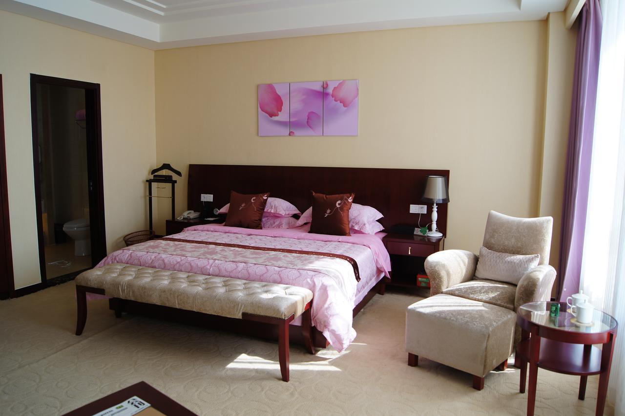 Fuxing Oriental Boutique Hotel Чифын Номер фото