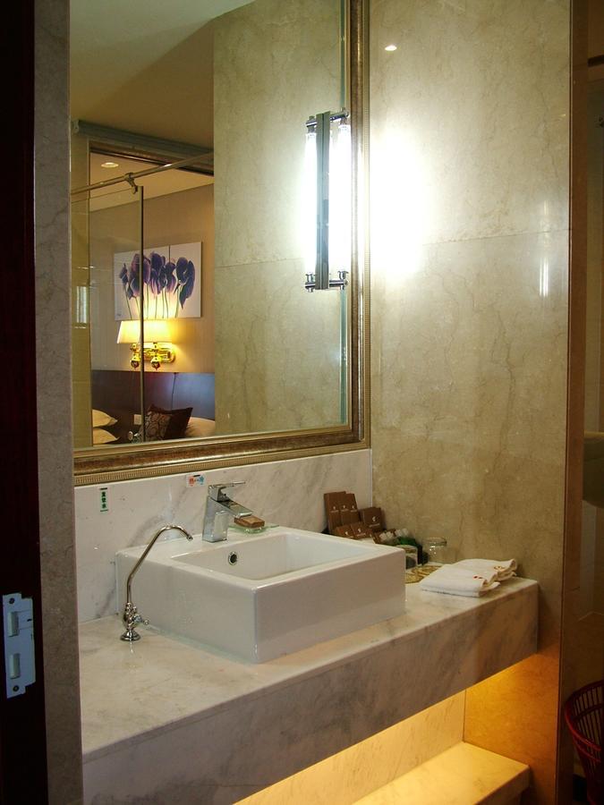 Fuxing Oriental Boutique Hotel Чифын Номер фото