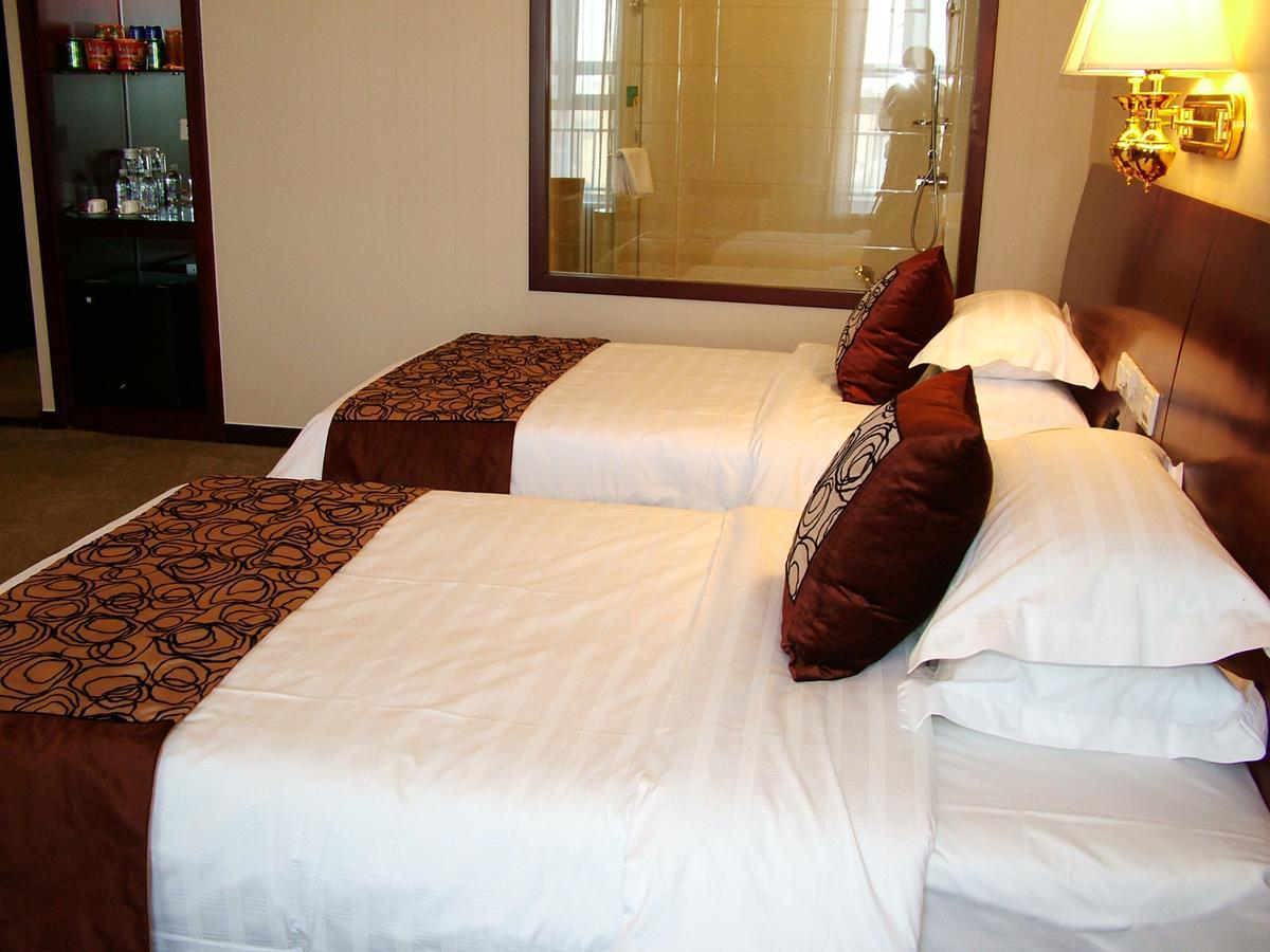 Fuxing Oriental Boutique Hotel Чифын Номер фото