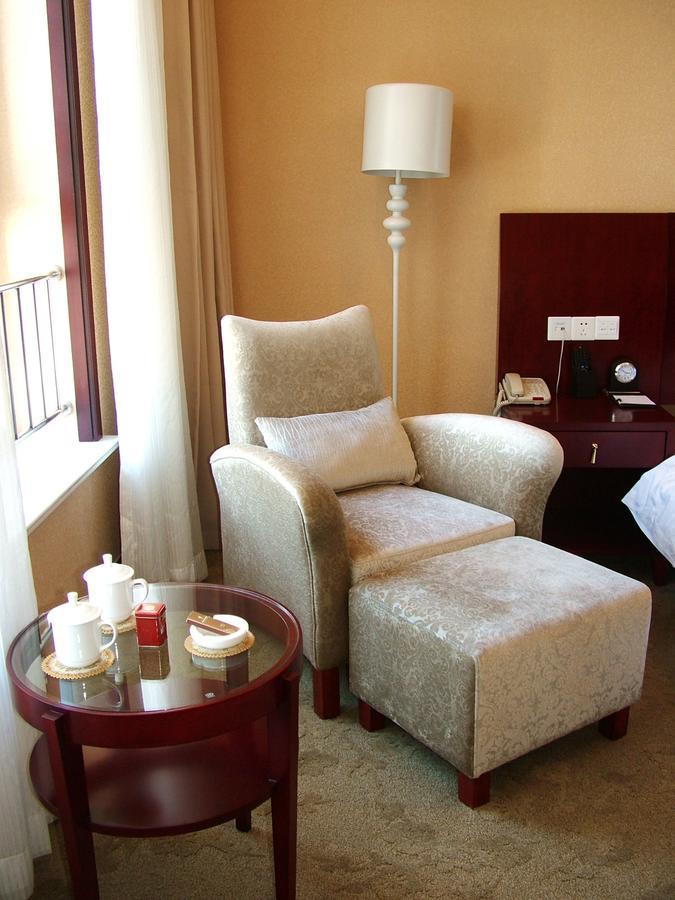 Fuxing Oriental Boutique Hotel Чифын Номер фото