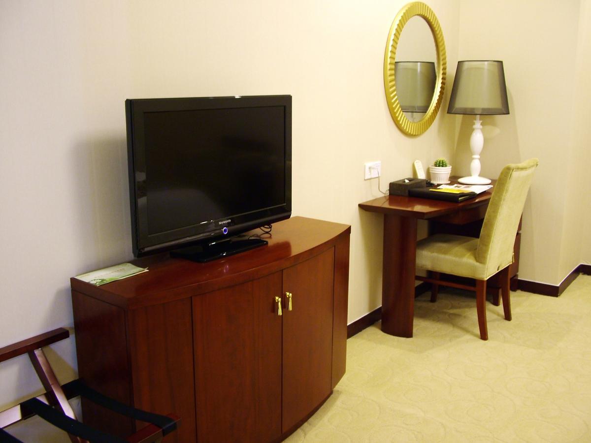 Fuxing Oriental Boutique Hotel Чифын Номер фото