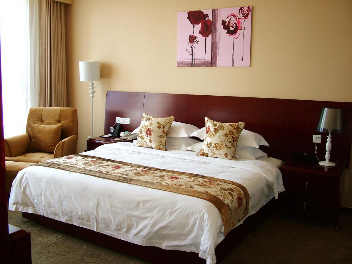 Fuxing Oriental Boutique Hotel Чифын Номер фото