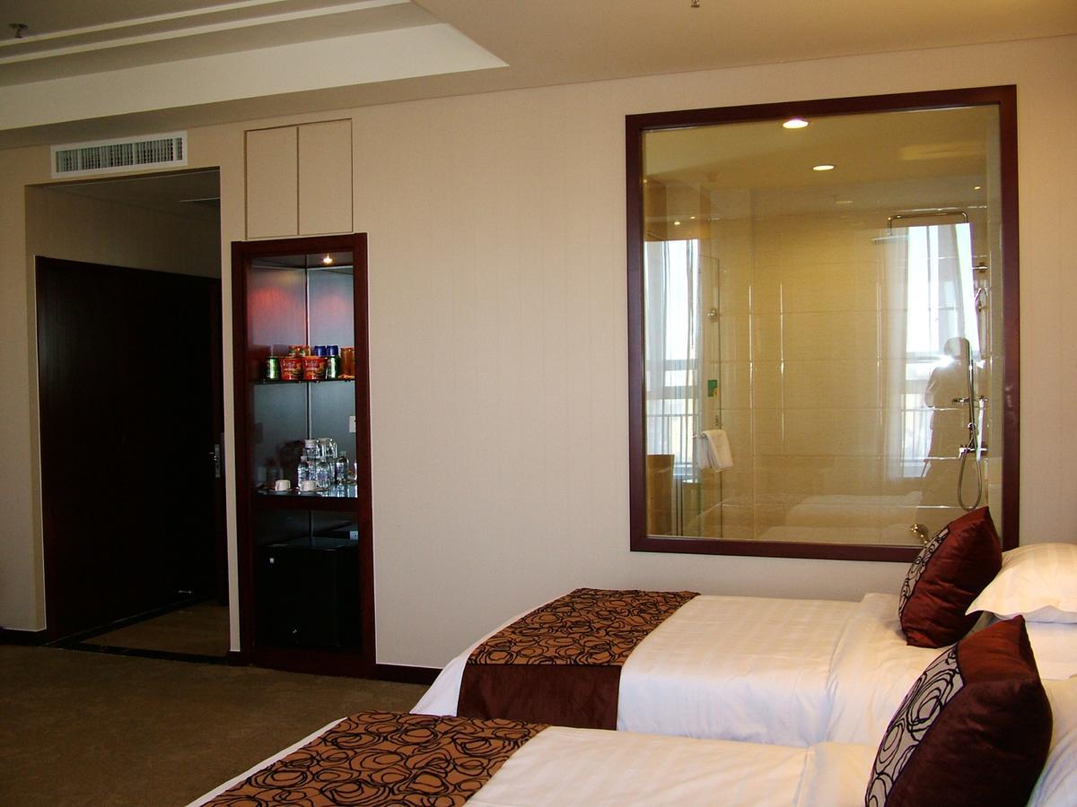 Fuxing Oriental Boutique Hotel Чифын Номер фото